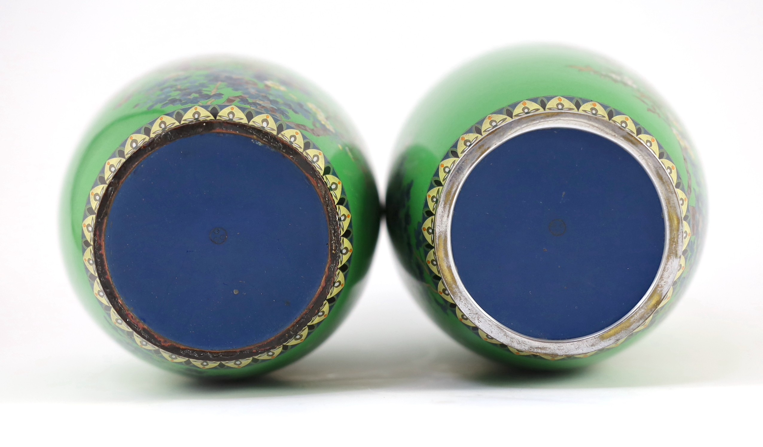 A pair of Japanese cloisonné enamel vases, early 20th century, 21.3cm high, one damaged